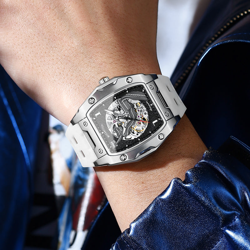 	man wearing MUSANFIGO MF03 square tonneau skeleton watch on wrist - casual business outfit with blazer