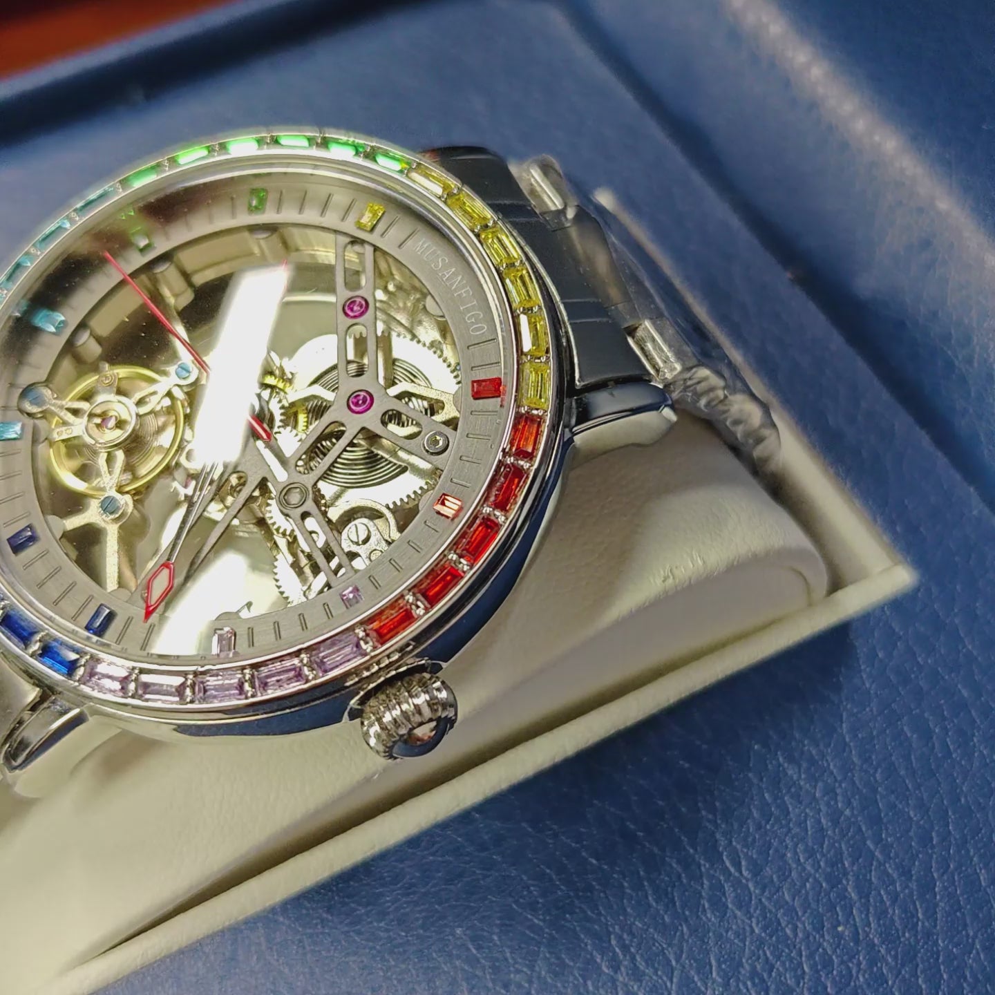 MUSANFIGO MG01 automatic skeleton watch video preview - rainbow bezel and exposed movement in motion